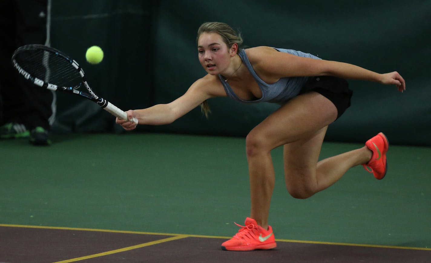 Eagan's Samantha Nichols dug out a ball during her match against Rochester Mayo's Jessica Marmorstien ] (KYNDELL HARKNESS/STAR TRIBUNE) kyndell.harkness@startribune.com Eagan vs Rochester Mayo girls class AA quarter finals in Minneapolis Min., Tuesday October 27, 2015.