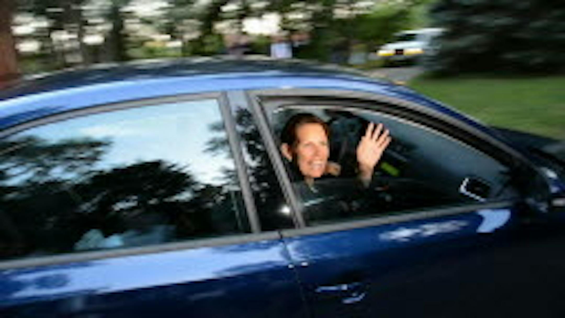Bachmann waves goodbye to reporters in Rochester
