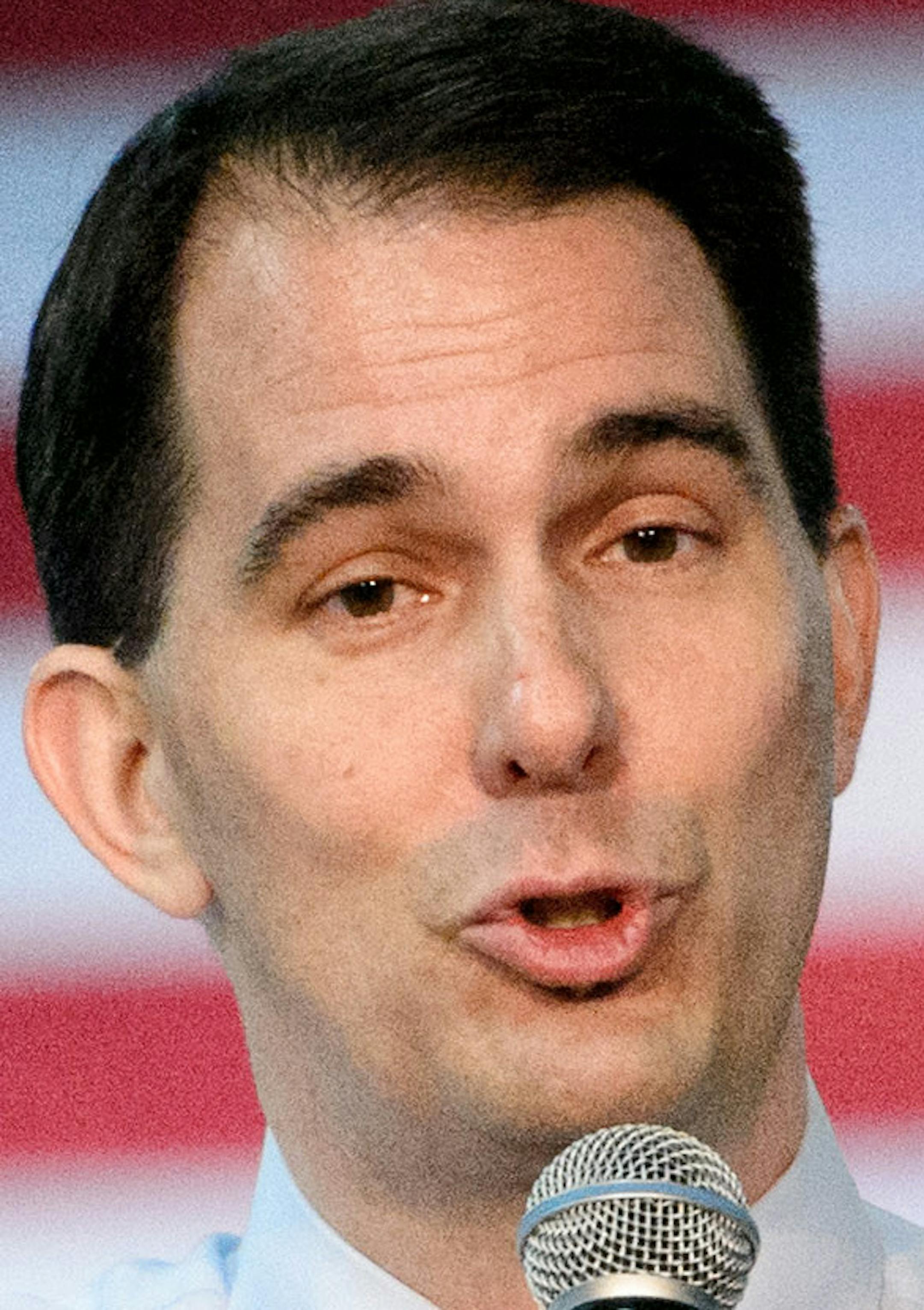 Wisconsin Gov. Scott Walker announced his "Day One Plan" to replace Obamacare. He spoke to a small and friendly crowd gathered at Cass Screw Machine Company, Brooklyn Center where he detailed his plan to replace Obamacare. ] GLEN STUBBE * gstubbe@startribune.com Tuesday, August 18, 2015 Wisconsin Gov. Scott Walker brought his presidential campaign to Minnesota to a small and friendly crowd gathered at Cass Screw Machine Company, Brooklyn Center where he detailed his plan to replace Obamacare.