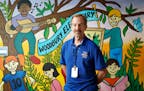 Ferd Schlapper is a math tutor with AmeriCorps, a national "Peace Corps" that gives boosts to kids in math and reading. He volunteers at Woodbury Elem