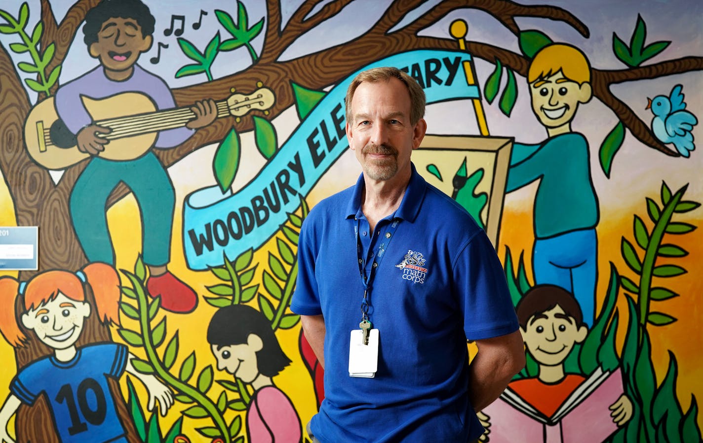 Ferd Schlapper is a math tutor with AmeriCorps, a national "Peace Corps" that gives boosts to kids in math and reading. He volunteers at Woodbury Elementary School. ] GLEN STUBBE &#x2022; glen.stubbe@startribune.com Monday, August 26, 2019