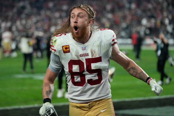 San Francisco tight end George Kittle celebrated the 49ers’ overtime win over the Raiders that lifted his team into second place in the NFC.