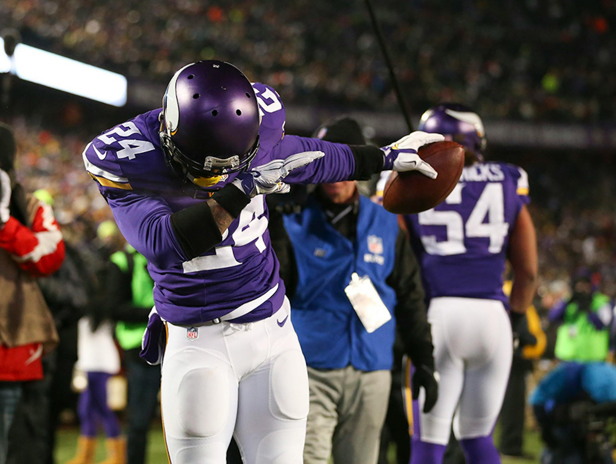 Vikings cornerback Captain Munnerlyn took a bow for thge stands after intercepting a pass in the third quarter Sunday night. He returned it for 32 yards, setting up a Vikings TD.