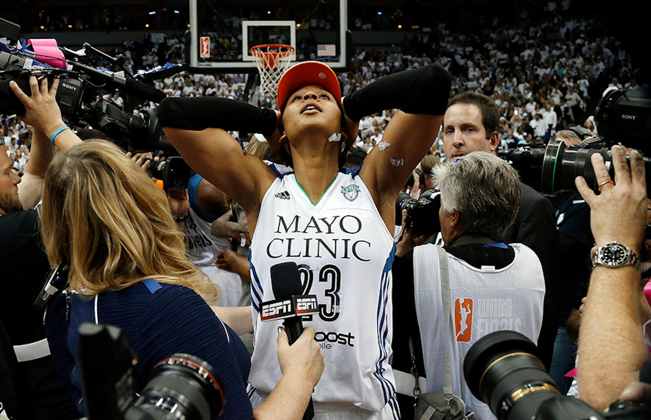 Minnesota Lynx forward Maya Moore (23) celebrates after beating the Indiana Fever 69-52 in Game 5 of the WNBA basketball finals, Wednesday, Oct. 14, 2015, in Minneapolis.