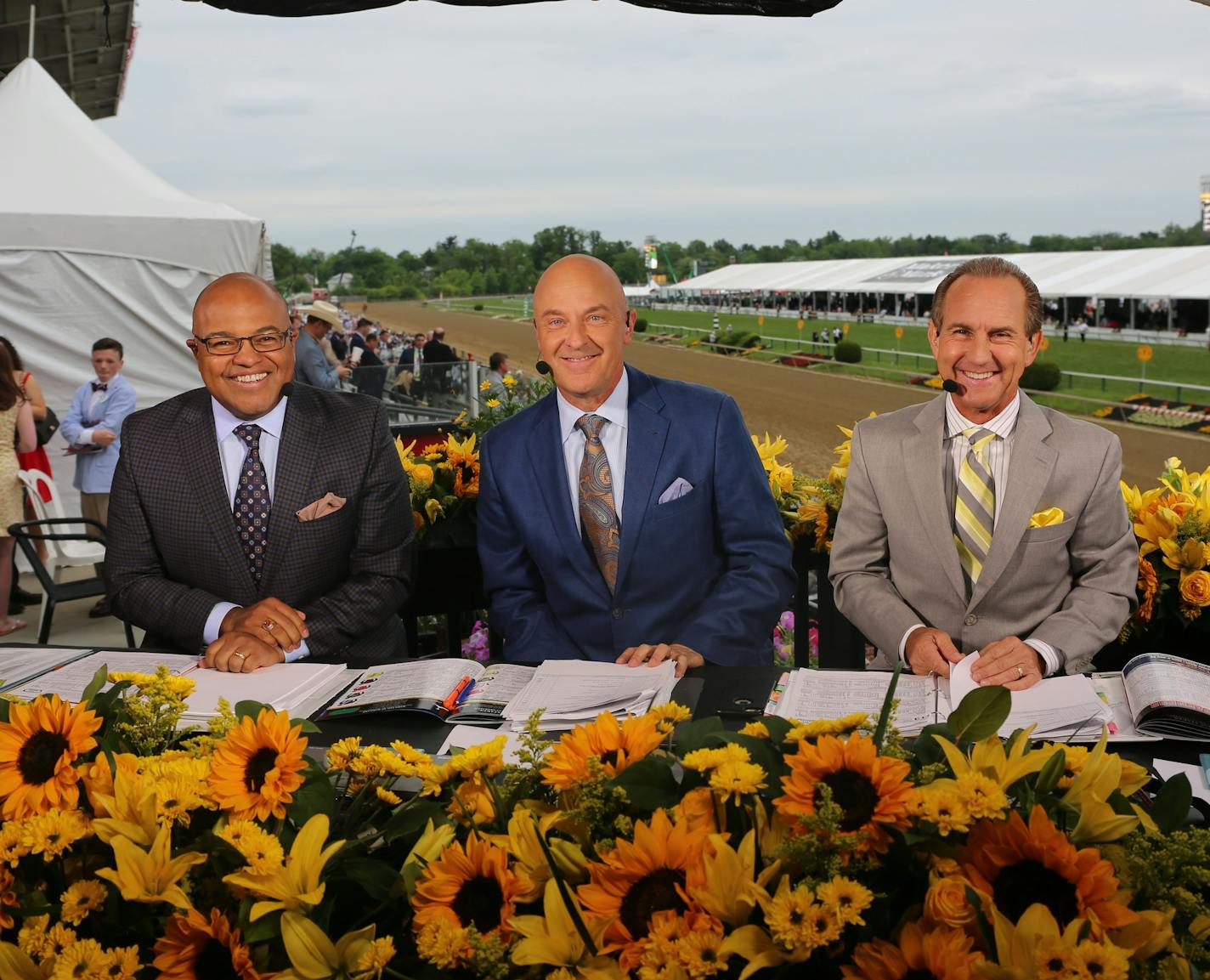 Randy Moss (center) with host Mike Tirico & Hall of Fame jockey/NBC analyst Jerry Bailey Credit: NBC Sports Group