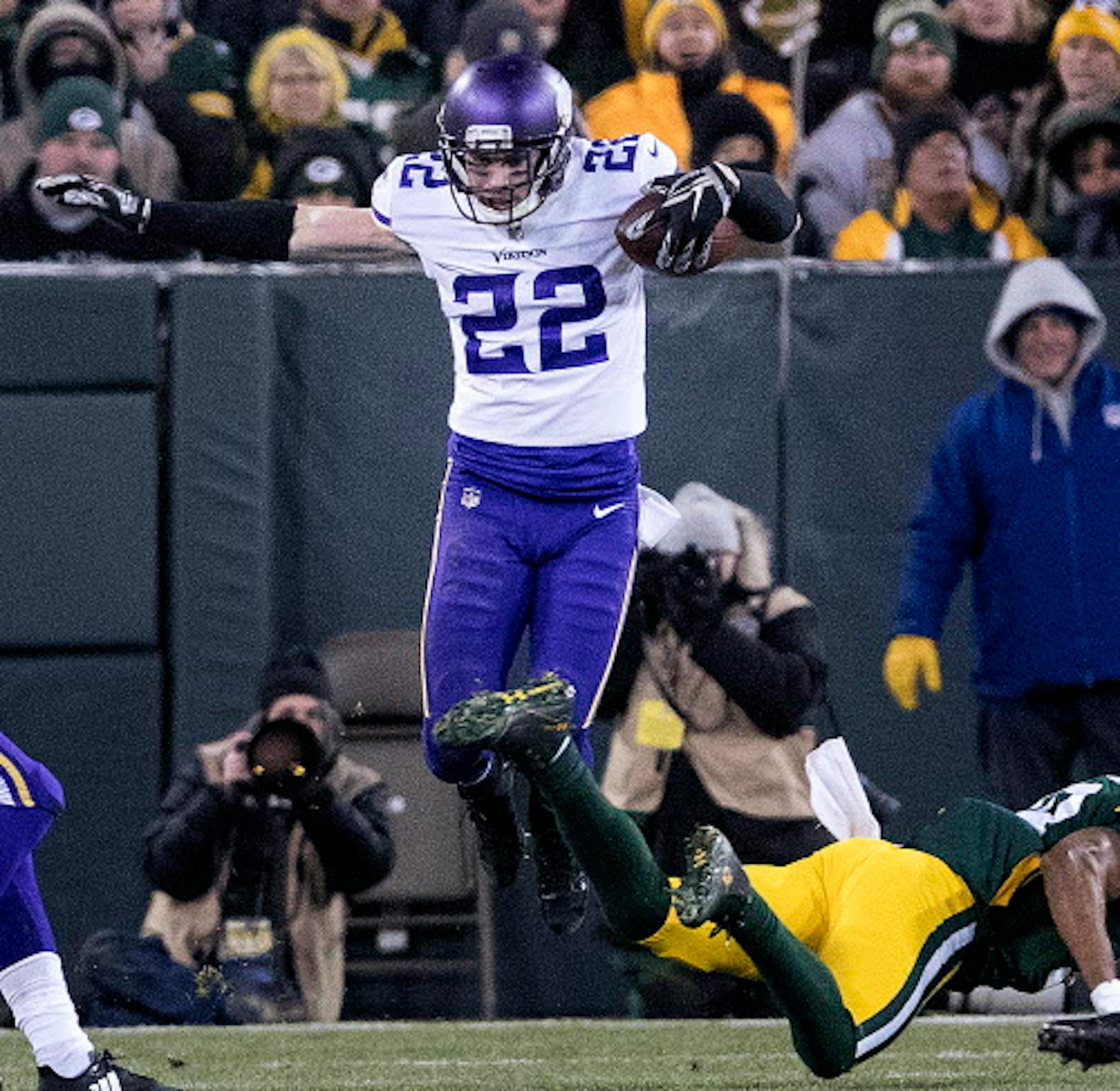 Minnesota Vikings defensive back Harrison Smith (22) intercepts a pass in the second quarter against the Green Bay Packers on Saturday, Dec. 23, 2017, at Lambeau Field in Green Bay, Wis. (Carlos Gonzalez/Minneapolis Star Tribune/TNS) ORG XMIT: 1219384