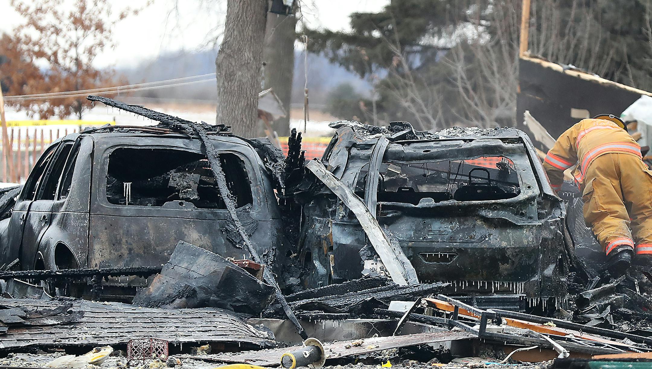 A firefighter sifts through the rubble after one person died and another was seriously injured following a house explosion Tuesday, Feb. 5, 209, in the southern Dakota County community of Hampton, MN.] DAVID JOLES •david.joles@startribune.com One person died and another was seriously injured after a house exploded Tuesday morning in the southern Dakota County community of Hampton.