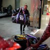 Natalie Darwitz, general manager of the PWHL's Minnesota team, loads duffel bags onto the team’s truck at Xcel Energy Center in January. With such a