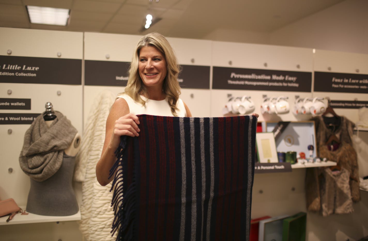 Julie Guggemos folded a blanket in an area at the Target headquarters in Minneapolis where upcoming product releases are on display. ] JEFF WHEELER &#x201a;&#xc4;&#xa2; jeff.wheeler@startribune.com Julie Guggemos, Target Corp.'s senior VP of product design and development, is unusual for what's not on her resume -- a background in design. She just has an eye, the kind that puts the "Tar-zhay" in Target. After starting as a toy buyer in 1990, she rose through the ranks and has been responsible fo