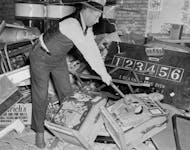 Hennepin County deputy sheriff C. V. Swanberg destroyed paraphernalia from a gambling club in 1939.