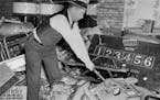 Hennepin County Deputy Sherriff C. V. Swanberg destroyed paraphernalia from a gambling club in 1939.