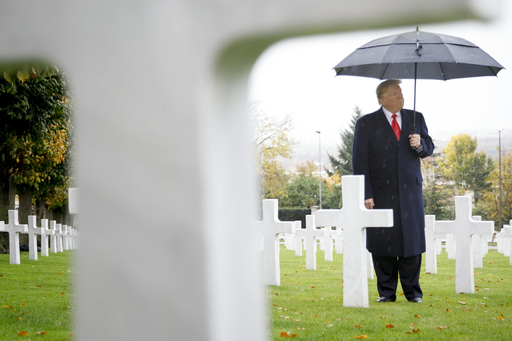 FILE -- President Donald Trump attends the American Commemoration Ceremony at Suresnes American Cemetery in Suresnes, France, Nov. 11, 2018. Liberal groups have ramped up efforts to win over veterans and military families in swing states, where even a small shift could prove decisive. (Tom Brenner/The New York Times)