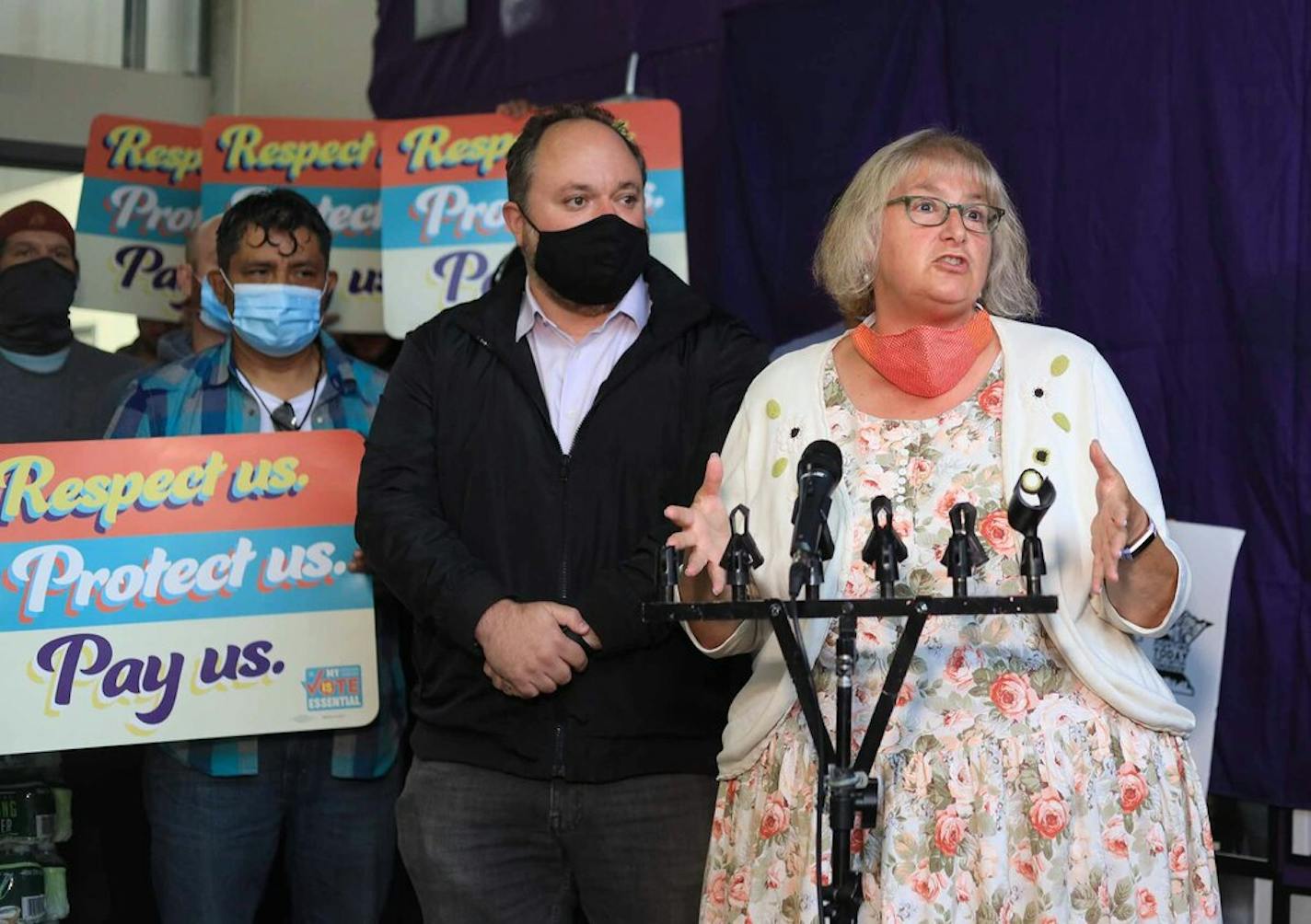 The central business district's Council Members Lisa Goodman (Ward 7) and Steve Fletcher (Ward 3) joined forces in support of downtown window washers on strike during contract negotiations.