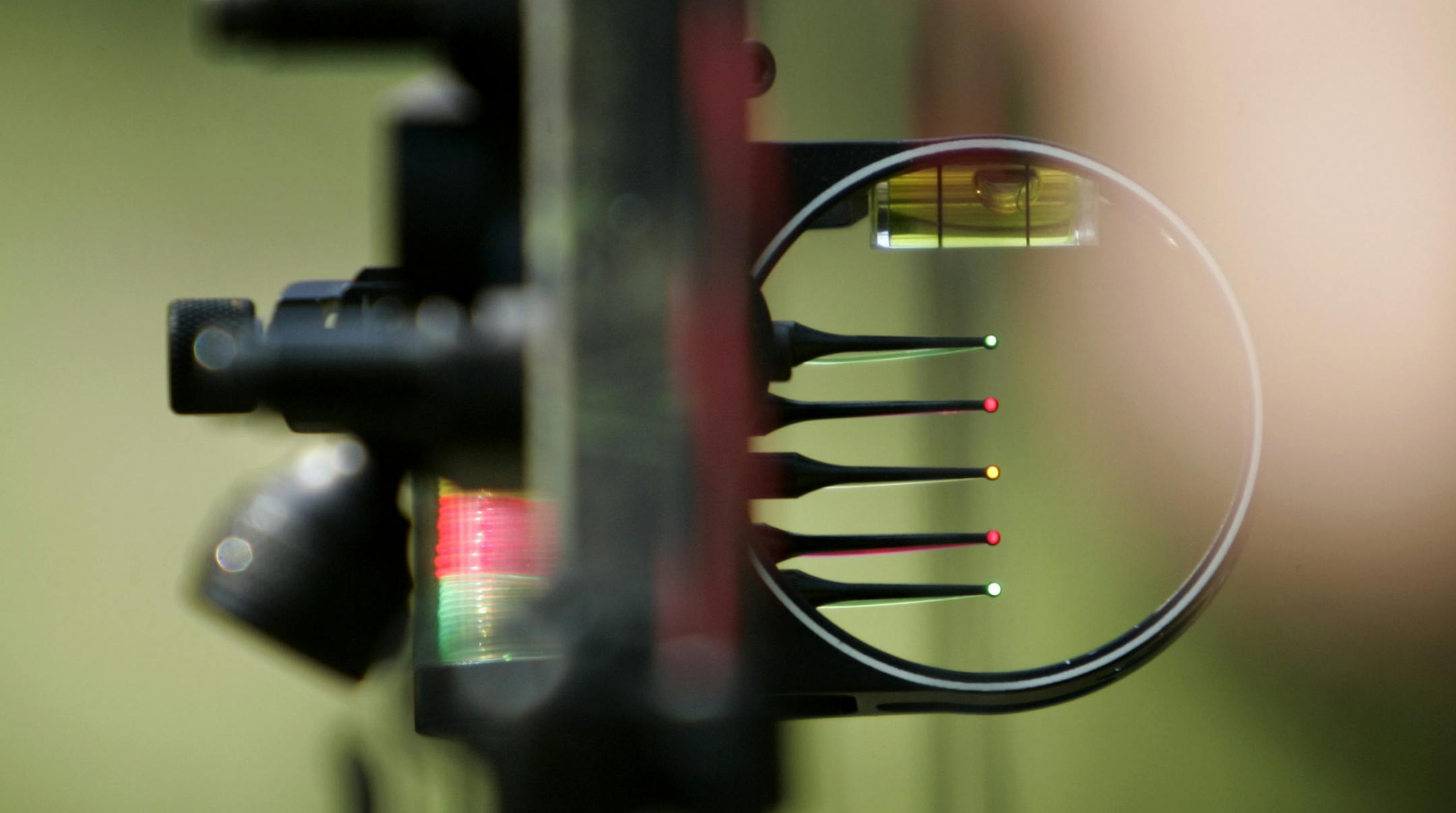 Star Tribune/Stormi Greener 09/08/2005 New Technology in the Archery industry come home for the hunting season Andy Larson, Maple wood demonstrates the new compound Bow with sights and counter weights all to help the hunter hit his target.