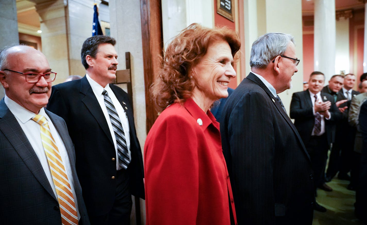 Sen. Carrie Ruud, R-Breezy Point, entered the Minnesota House Chamber along with other senators to attend the governor's State of the State address On March 14.