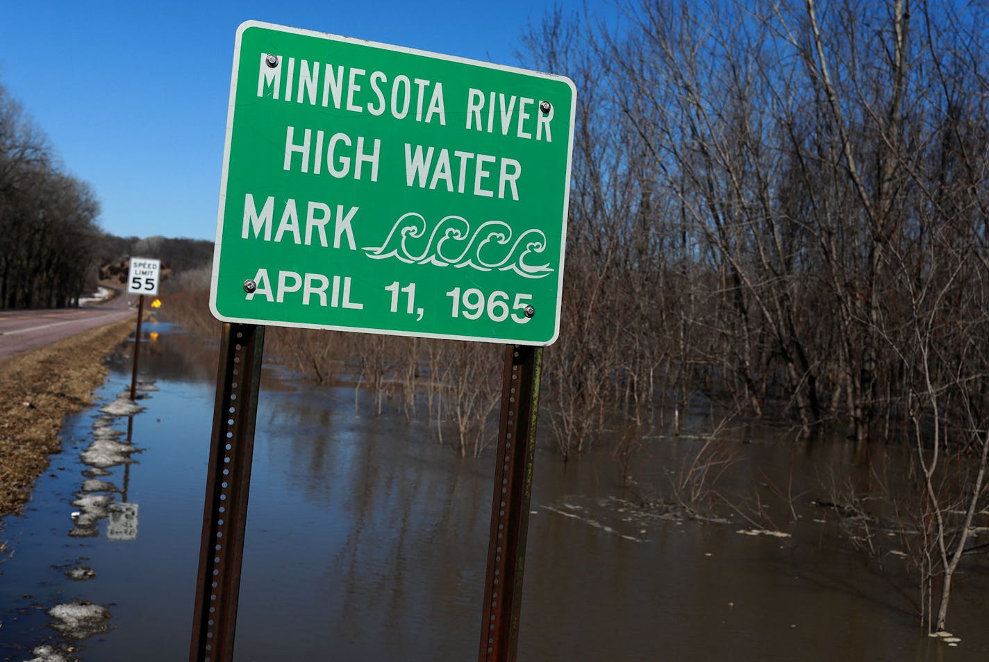 The Minnesota River on Wednesday near Belle Plaine. Moderate flooding and road closures are still expected across Minnesota, even with the gradual snowmelt.