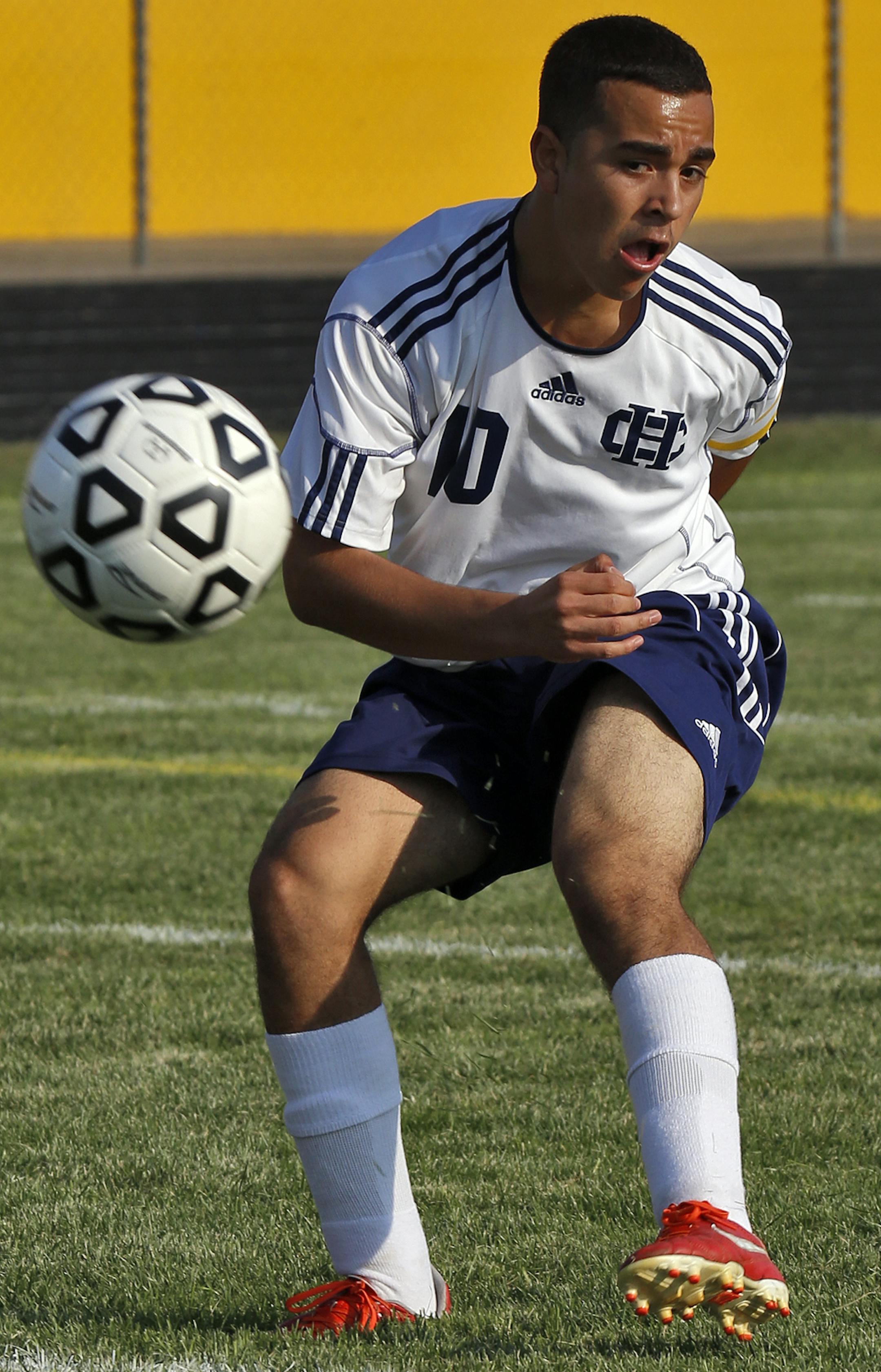 Profile of Columbia Heights soccer player Hussein Arafa Mohamed photographed during a recent game against Fridley. Mohamed advanced the ball. (MARLIN LEVISON/STARTRIBUNE(mlevison@startribune.com)