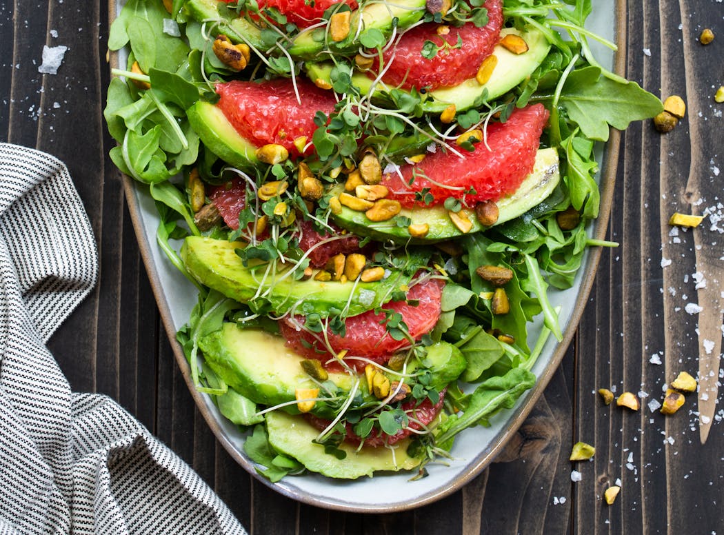Grapefruit, avocado and arugula come together in a vibrant salad.