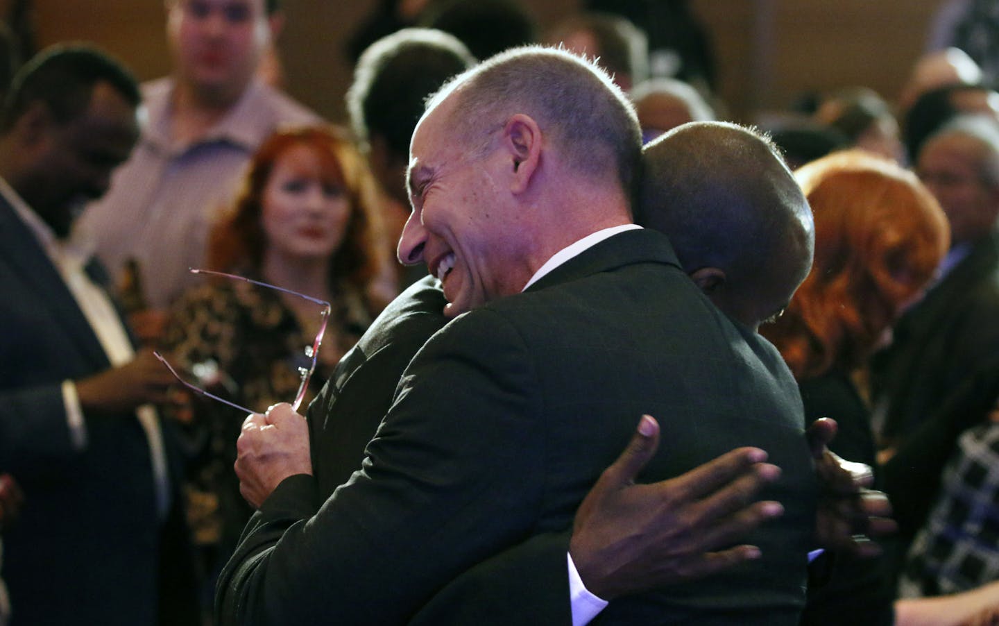 Dan Doc Severson running for Secretary of State hugs Abdimalik Askar running for state Represenative in 60b. ] GOP Headquarters BRIAN PETERSON &#x201a;&#xc4;&#xa2; brian.peterson@startribune.com Minneapolis, MN 11/04/14