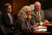 One of the letter's authors, Sue Abderholden of the National Alliance on Mental Illness of Minnesota, answers questions from legislators during a hear