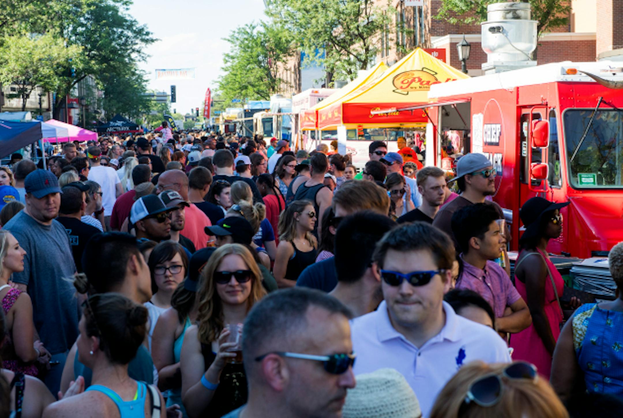 Masses of people packed Hennepin Avenue later in the afternoon for the Food Truck Festival.   ]     Isaac Hale ' isaac.hale@startribune.com  The Food Truck Festival was held Uptown along Hennepin Avenue on Sunday, June 26, 2016, and featured more than 50 food trucks.