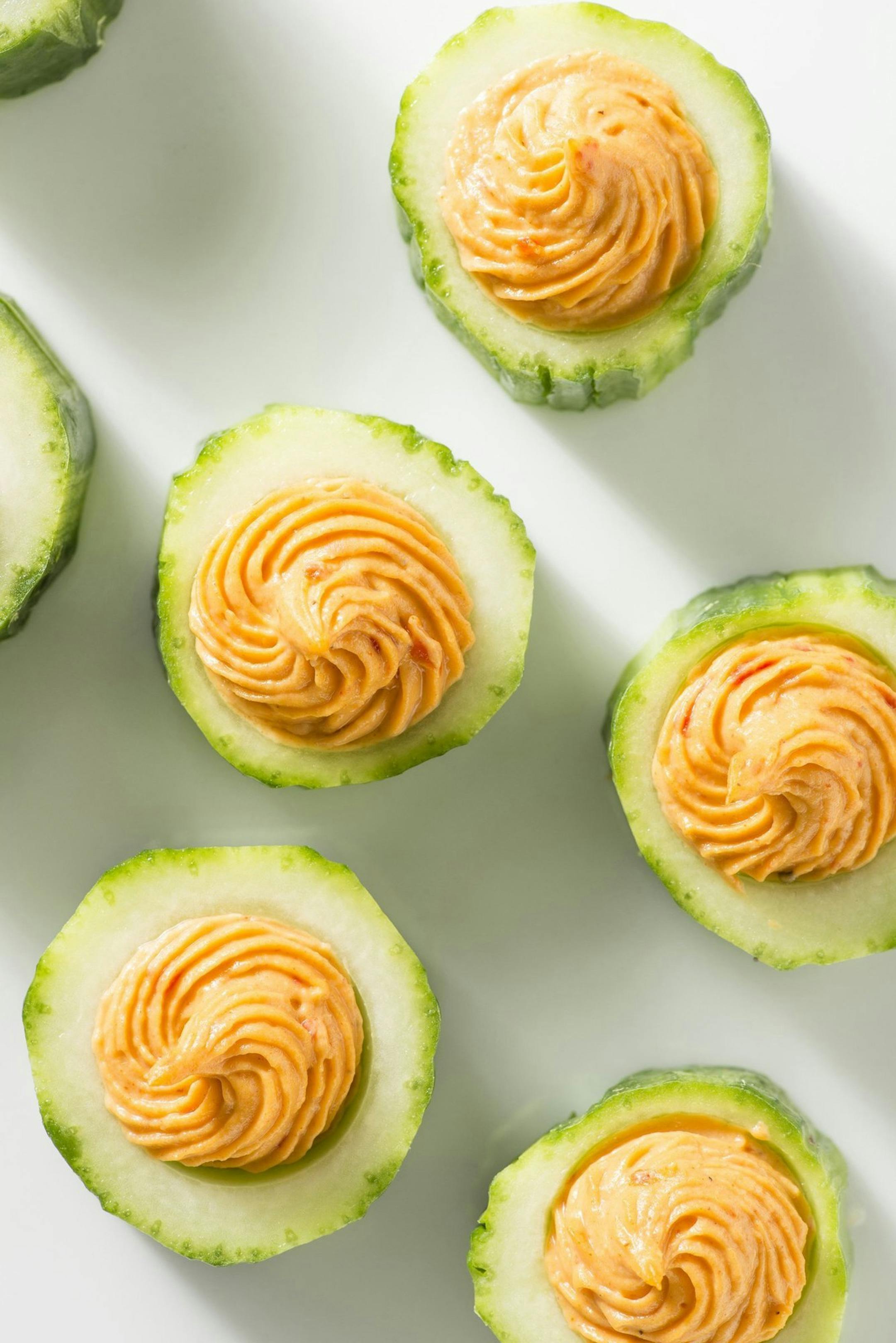 With the new year many people vow to adopt better eating habits. These roasted red pepper hummus in cucumber cups are from Giada de Laurentis' "Feel Good Food." (Amy Neunsinger/Fresno Bee/MCT) ORG XMIT: 1147408