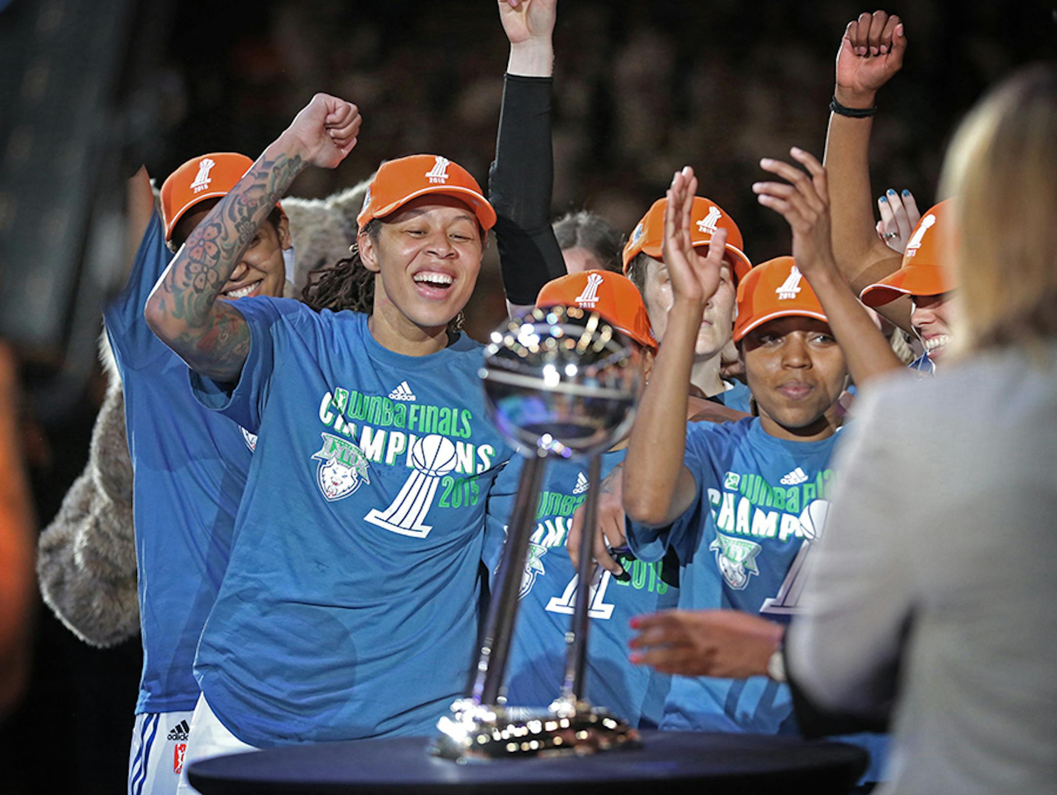The Minnesota Lynx celebrate winning the WNBA title.