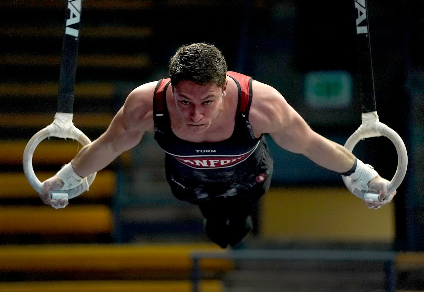 Stanford's Trevor DiGerolamo performs on the still rings against California during an NCAA gymnastics meet on Sunday, Jan. 27, 2019 in Berkeley, Calif. (AP Photo/Tony Avelar)