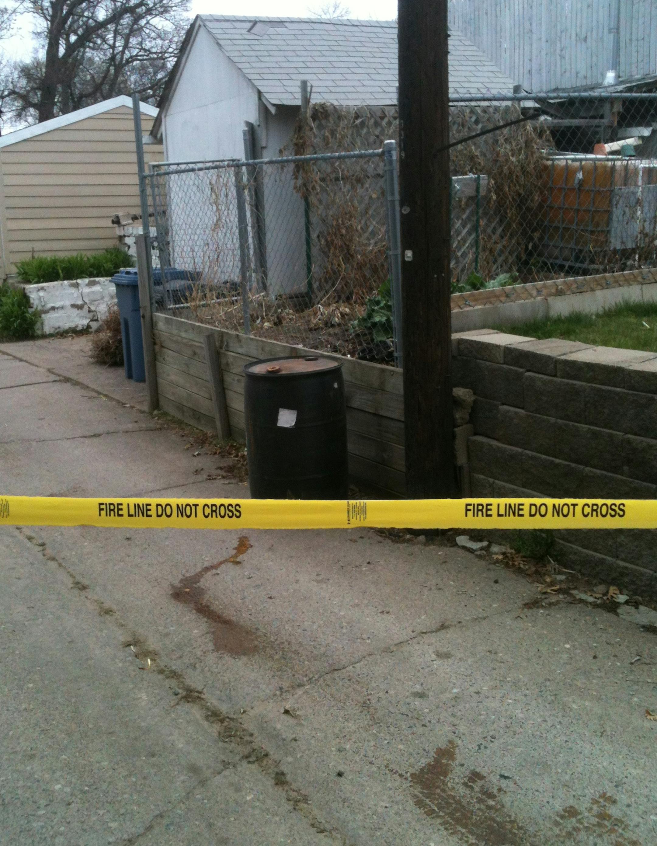 The mysterious drum of chemicals appeared in April in the alley behind Tom Specht's home in north Minneapolis. Three months later, how it got there is still a mystery.