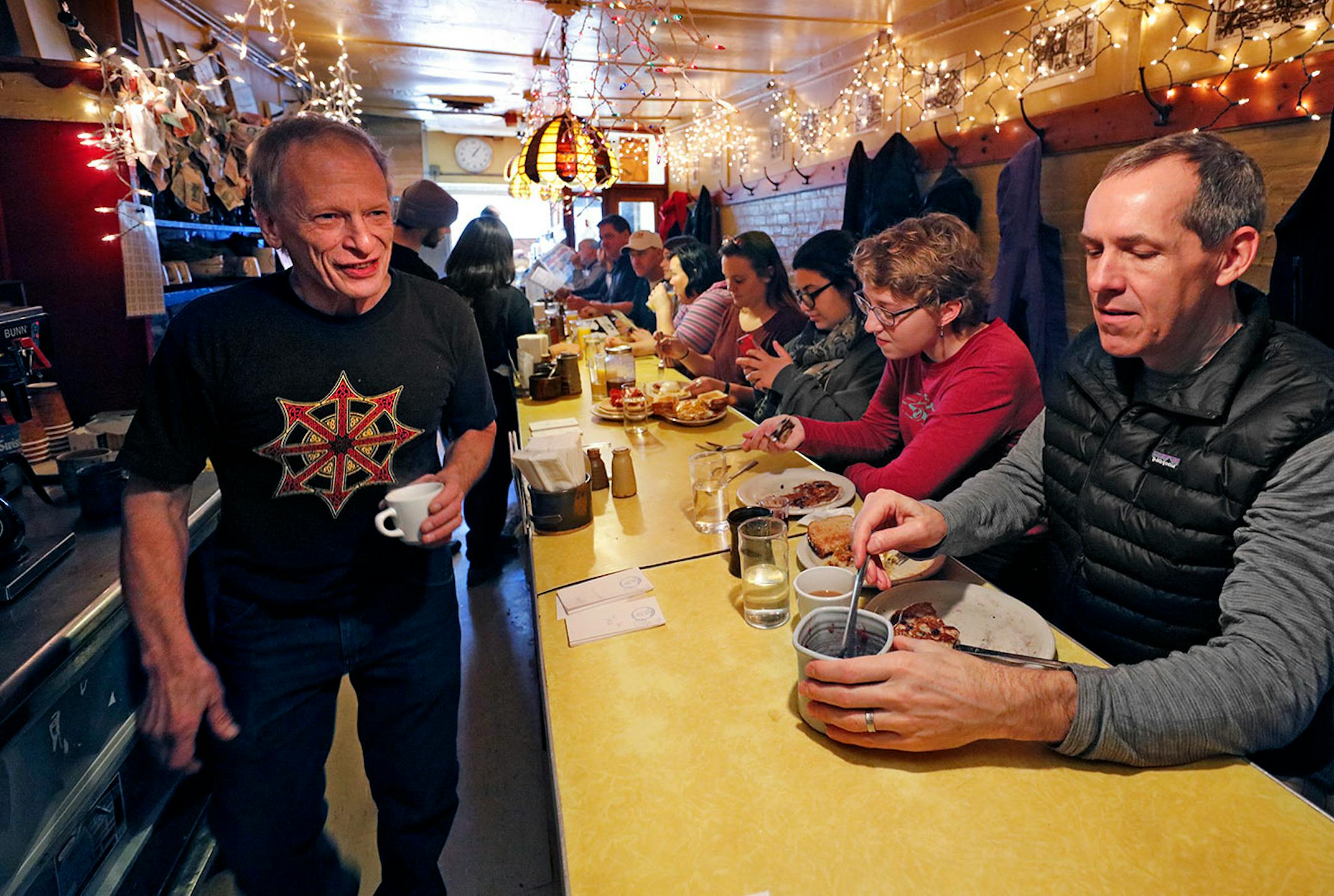 Doug Grina, one of the original owners behind the counter at Al's Breakfast. ... A changing of the guard at the institution, Al's Breakfast. Doug Grina, one of the original owners and Alison Kirwin, his new partner, at the tiny 14-seat restaurant. Some of the food they are famous for are dishes like the, blueberry/walnut pancakes, bacon waffle, and the "Jose."