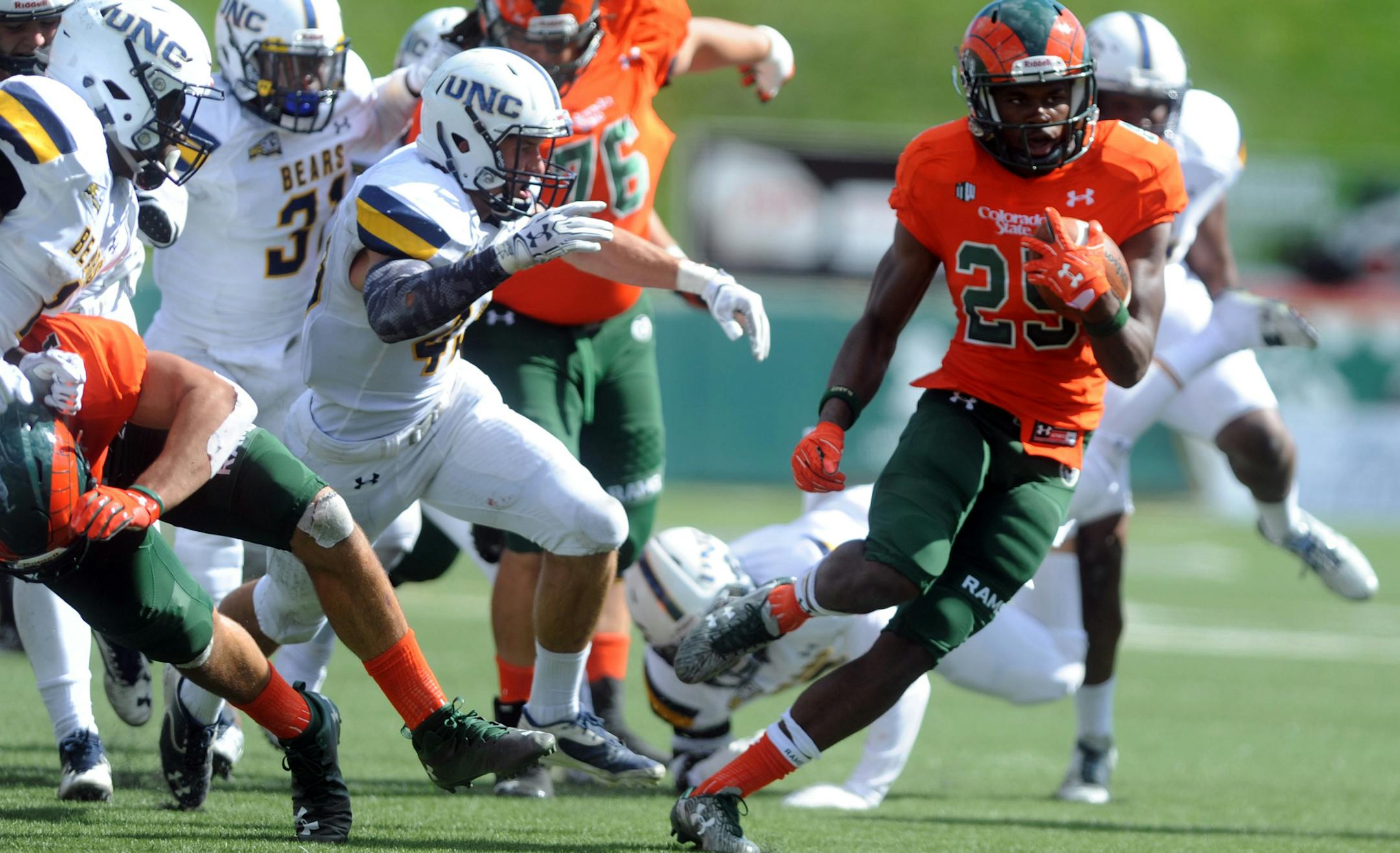 Colorado State's Marvin Kinsey, Jr. dodges several Northern Colorado defenders during an NCAA college football game Saturday, Sept. 17, 2016, in Fort Collins, Colo. (Joshua Polson/The Greeley Tribune via AP) ORG XMIT: COGRE103