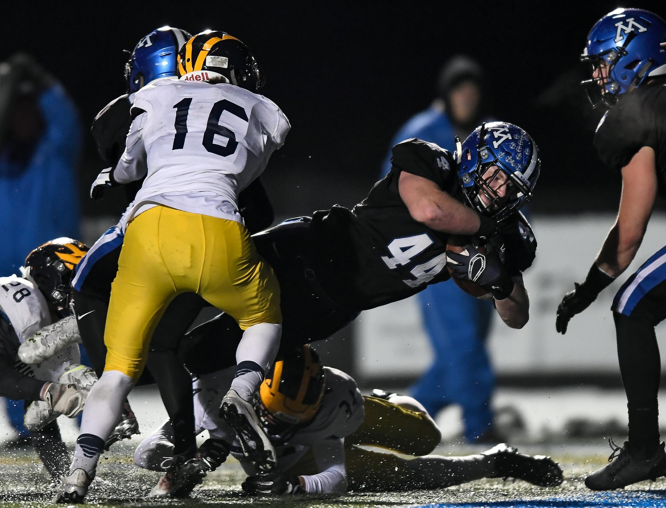 Minnetonka linebacker Ty Barron (44) dove into the end zone for a second half touchdown against Rosemount. ] AARON LAVINSKY &#xef; aaron.lavinsky@startribune.com Minnetonka played Rosemount in a Class 6A football playoff game on Friday, Nov. 3, 2017 at Minnetonka High School.