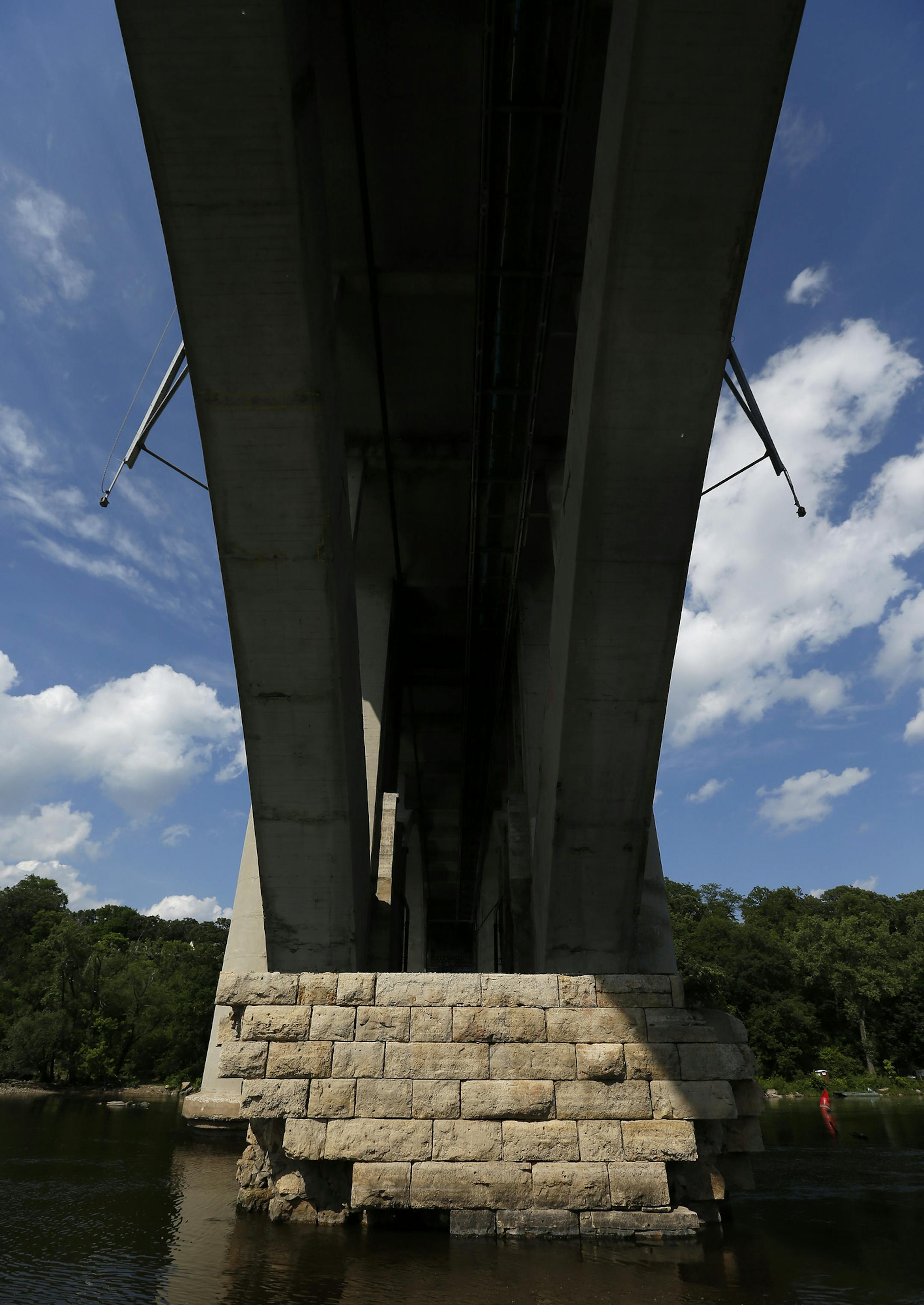 The remains of bridge piers from 1889 are located under the Franklin Avenue Bridge on the Mississippi river in Minneapolis. ] CARLOS GONZALEZ cgonzalez@startribune.com - June 23, 2015, Minneapolis, MN, Hennepin County and some fans of the 1889 bridge piers have been fighting a Coast Guard directive to remove them as part of the county renovation of the 1920s bridge. Order to remove dates back to before the current bridge