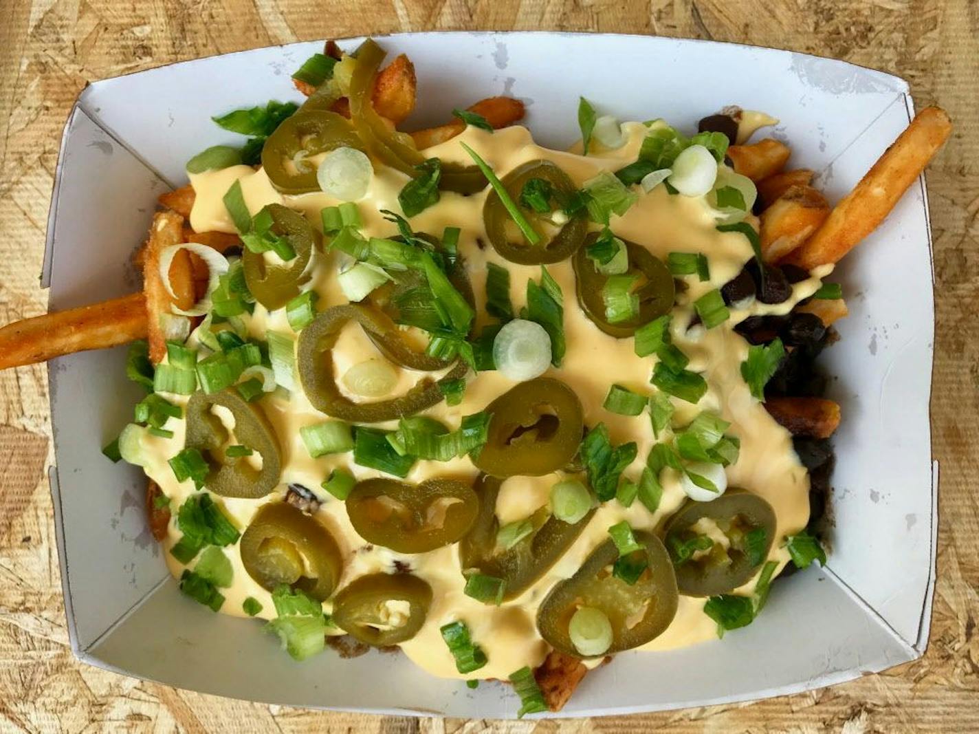 Loaded Fries, Taco Cat, International Bazaar, $12. Carb-loading, to the max, and cheese fries taken to the Nth degree. Fortunately, the super-crisp fries stand up to the challenge, and the components are first-rate. Maybe the fair's most shareable new food item. Photo by Rick Nelson New food at the Minnesota State Fair 2018