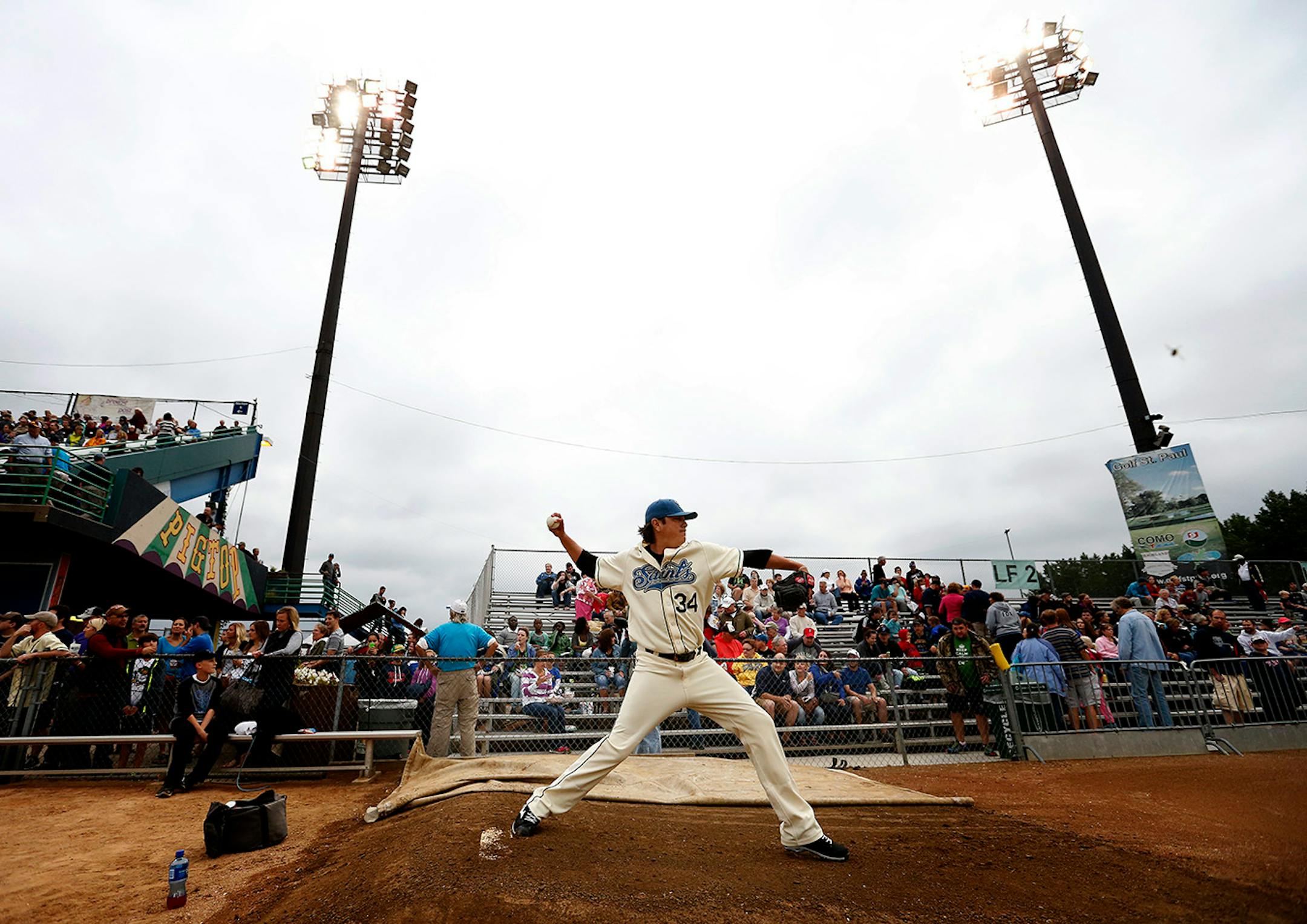 St. Paul Saints starting pitcher Anthony Claggett (34) warmed up in the bullpen before the St. Paul Saints final game at Midway Stadium on Thursday night. ] CARLOS GONZALEZ cgonzalez@startribune.com - August 28, 2014, St. Paul, Minn., Midway Stadium, St. Paul Saints baseball vs. Winnipeg - Final Saints game at Midway Stadium