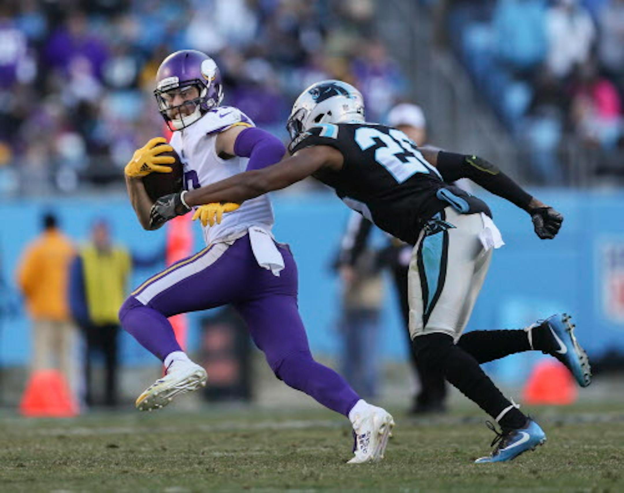 Minnesota Vikings's Adam Thielen breaks away from Carolina Panthers' Daryl Worley and picks up 7 yards on the play in the fourth quarter on Sunday, Dec. 10, 2017 at Bank of America Stadium in Charlotte, N.C. (Brian Peterson/Minneapolis Star Tribune/TNS) ORG XMIT: 1218168