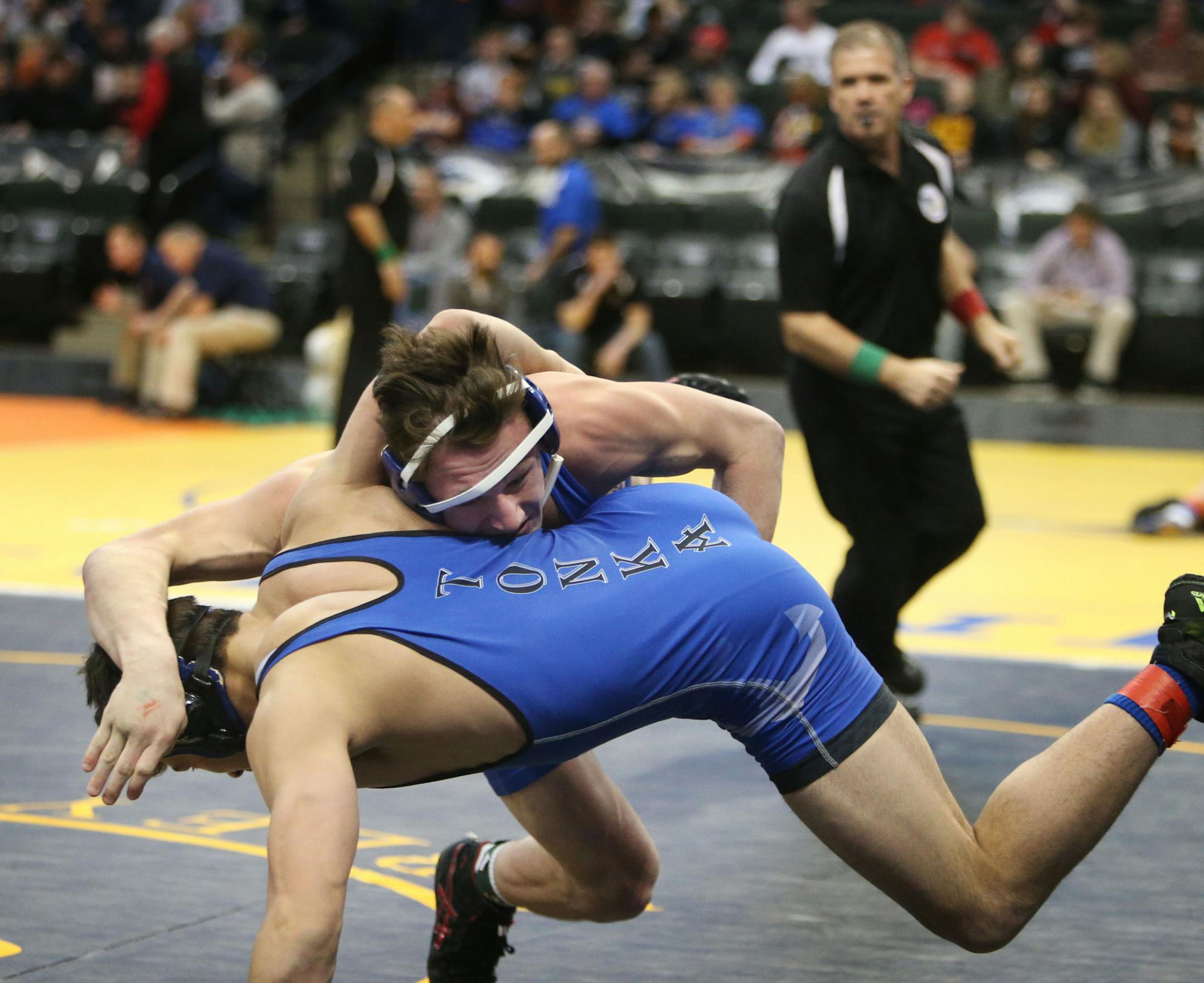 In 3A at 182 pounds Lucas Jeske of St. Michael-Albertville, top, tosses Logan Foote of Minnetonka during their match at the Minnesota State Wrestling tournament for 1A, 2A and 3A at the Xcel Energy Center Friday, Feb. 26, in 2016, in St. Paul, MN. Here, ](DAVID JOLES/STARTRIBUNE)djoles@startribune.com