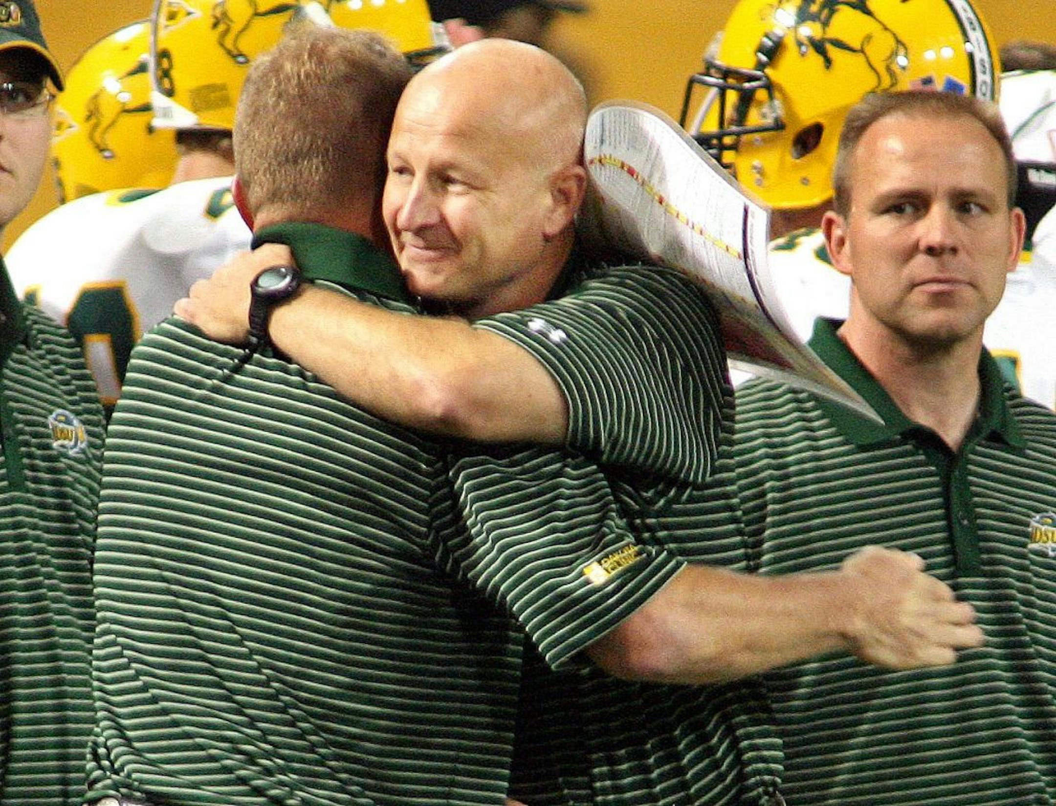 North Dakota State coach Craig Bohl, center, coached the Bison to an upset at Metrodome four years ago, and brings to town another Minnesota-heavy group that believes it can do it again.