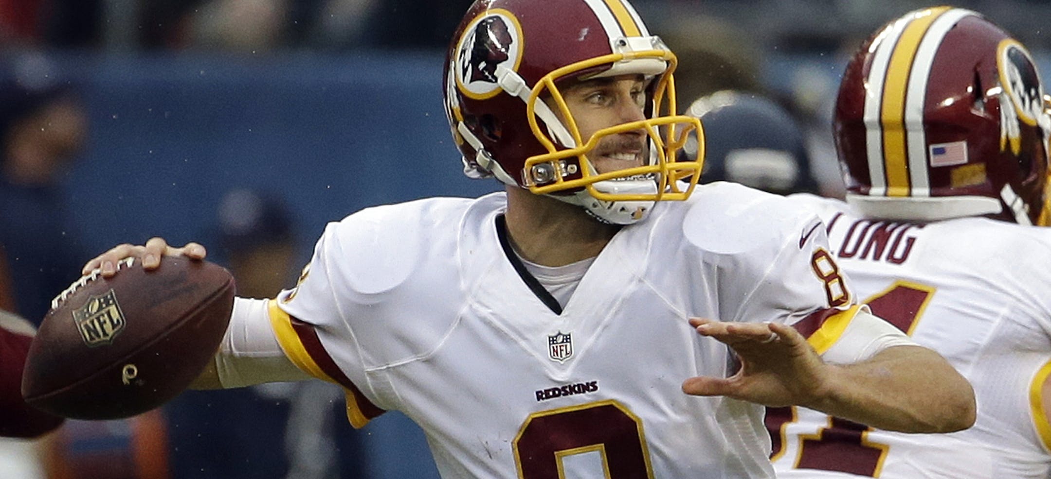 FILE - In this Dec. 13, 2015 file photo, Washington Redskins quarterback Kirk Cousins (8) throws during the second half of an NFL football game against the Chicago Bears in Chicago. Publicly, anyway, the Washington Redskins have not made clear whether they envision Kirk Cousins as their quarterback of the future. A look at his statistics, though, shows that Cousins is compiling numbers that make him look good when compared to Redskins QBs of the past. (AP Photo/Nam Y. Huh, File)