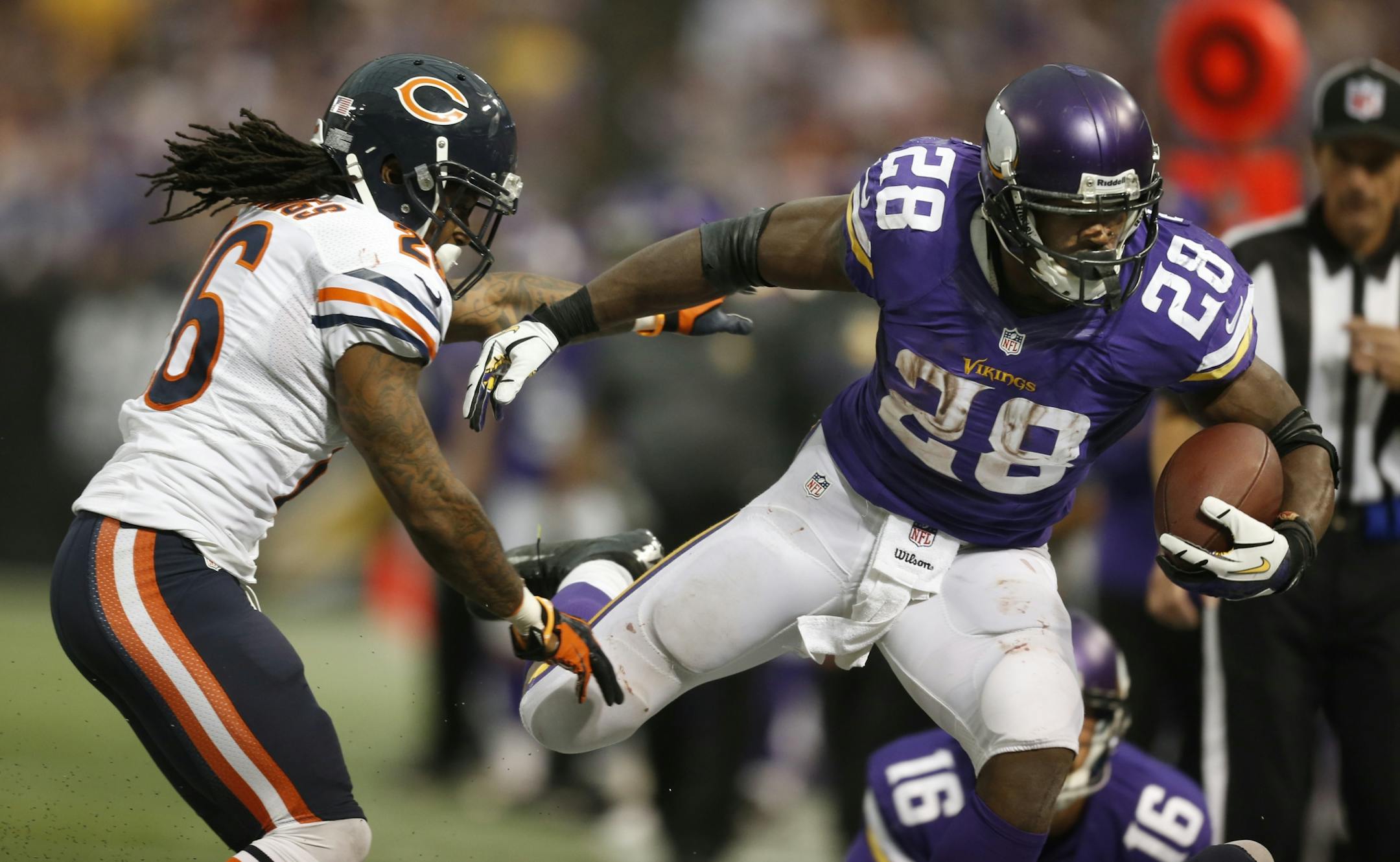 Vikings running back Adrian Peterson ran for 19 yards on 4th and 1 in the fourth quarter and passed 10,000 rushing yards for his career.