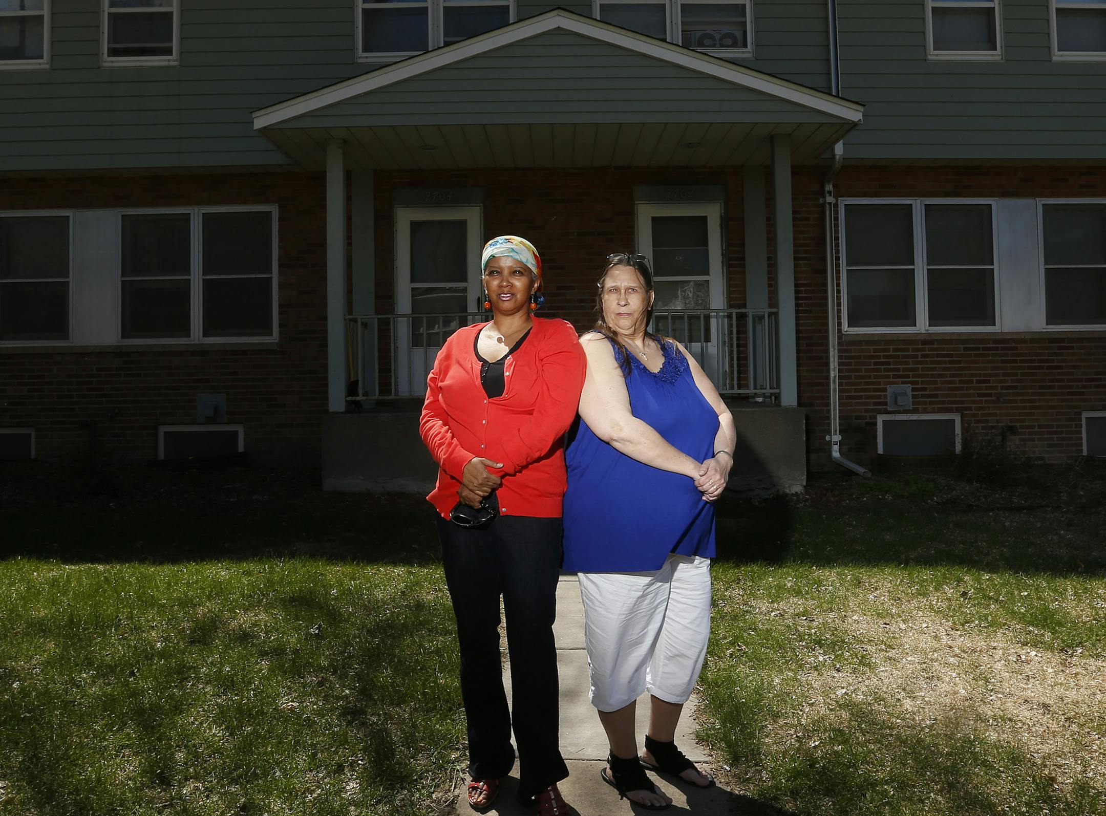 Prospect Park residents Ladan Yusuf and Michelle Montbriand. ] CARLOS GONZALEZ cgonzalez@startribune.com, April 27, 2015, Minneapolis, Minn., With MPHA planning to knock down and rebuild the little-known remaining housing project in the city, tucked into a shoulder of Prospect Park, residents are crying foul and raising issues of gentrification. Although all public housing units will be built on site, density on the 12-acre site will triple as the housing agency tries to squeeze in more tax cred