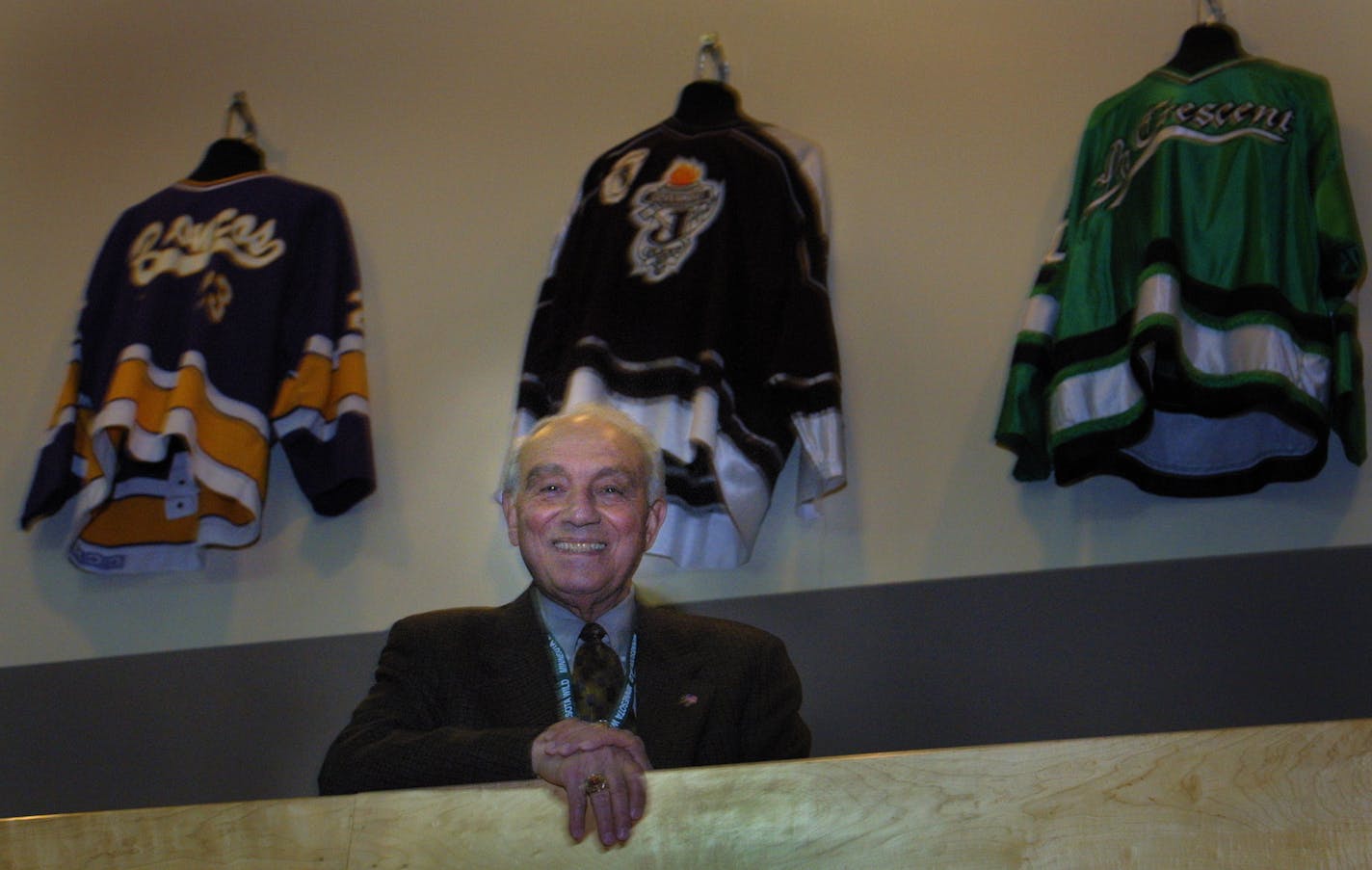 Lou Cotroneo, shown in 2001, might have been the happiest man in St. Paul, smiling, laughing and greeting everyone he met at Xcel Energy Center with a hearty handshake.