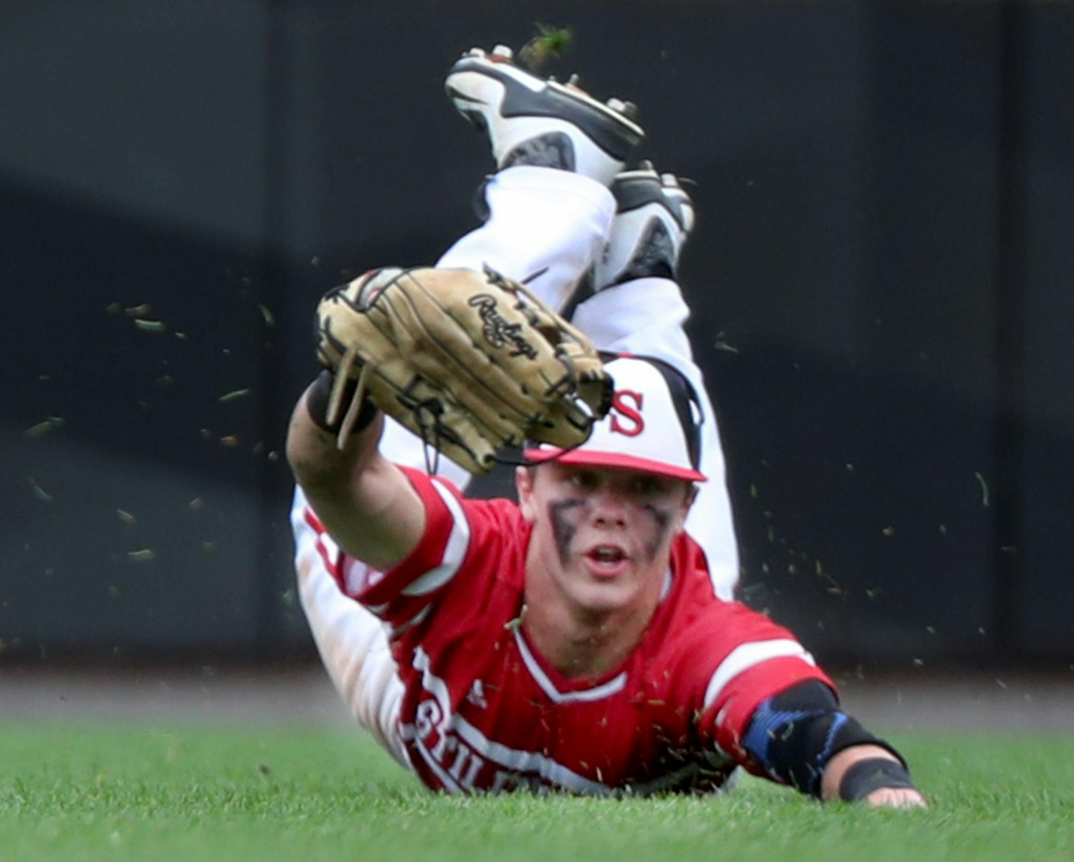 Stillwater center fielder Andrew Gilbert made a spectacular catch during the 6th inning of Stillwater's 4-3 win over Blaine during the class 4A baseball state semifinals Friday, June 15, 2018, in CHS Field in St. Paul, MN.] DAVID JOLES ï david.joles@startribune.com St. Michael-Albertville and Minnetonka in class 4A baseball state semifinals Friday, June 15, 2018, in CHS Field in St. Paul, MN.