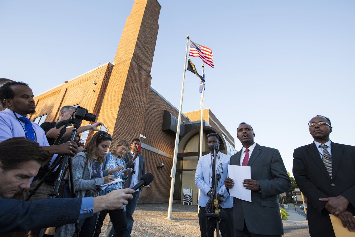 Abdulwahid Osman, the lawyer for the family of Dahir Adan, speaks during a press conference at St. Cloud City Hall.