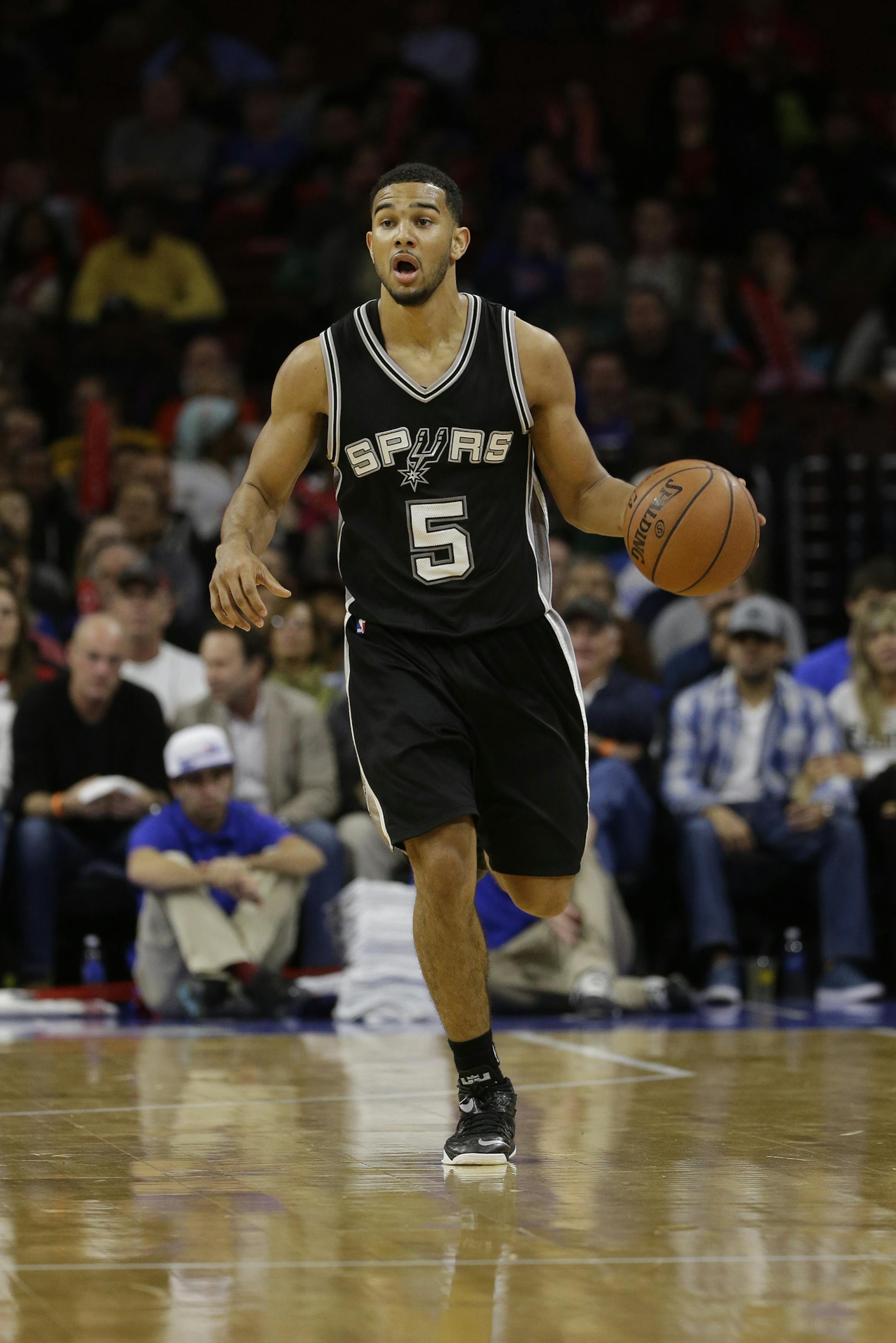 San Antonio Spurs' Cory Joseph in action during an NBA basketball game against the Philadelphia 76ers, Monday, Dec. 1, 2014, in Philadelphia. (AP Photo/Matt Slocum) ORG XMIT: OTKMS232