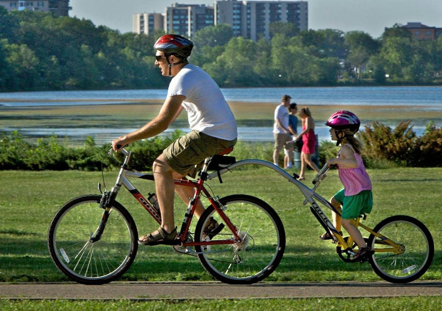 The Lake Calhoun bike path is a perfect place for a family ride.