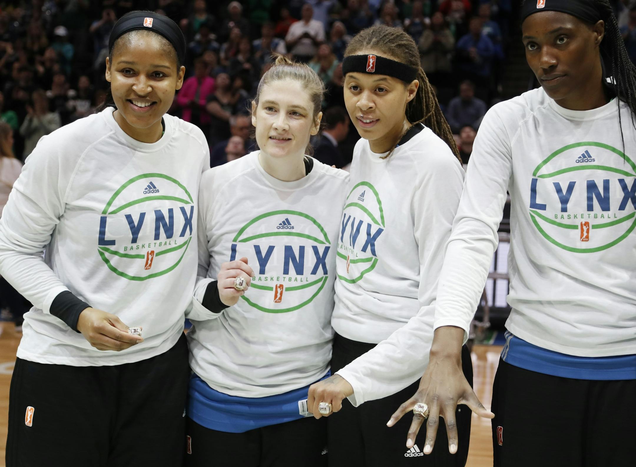 Maya Moore , Lindsay Whalen, Seimone Augustus, and Sylvia Fowles celebrated with their Olympic rings at Xcel Energy Center May 22, 2017 in St. Paul, MN.