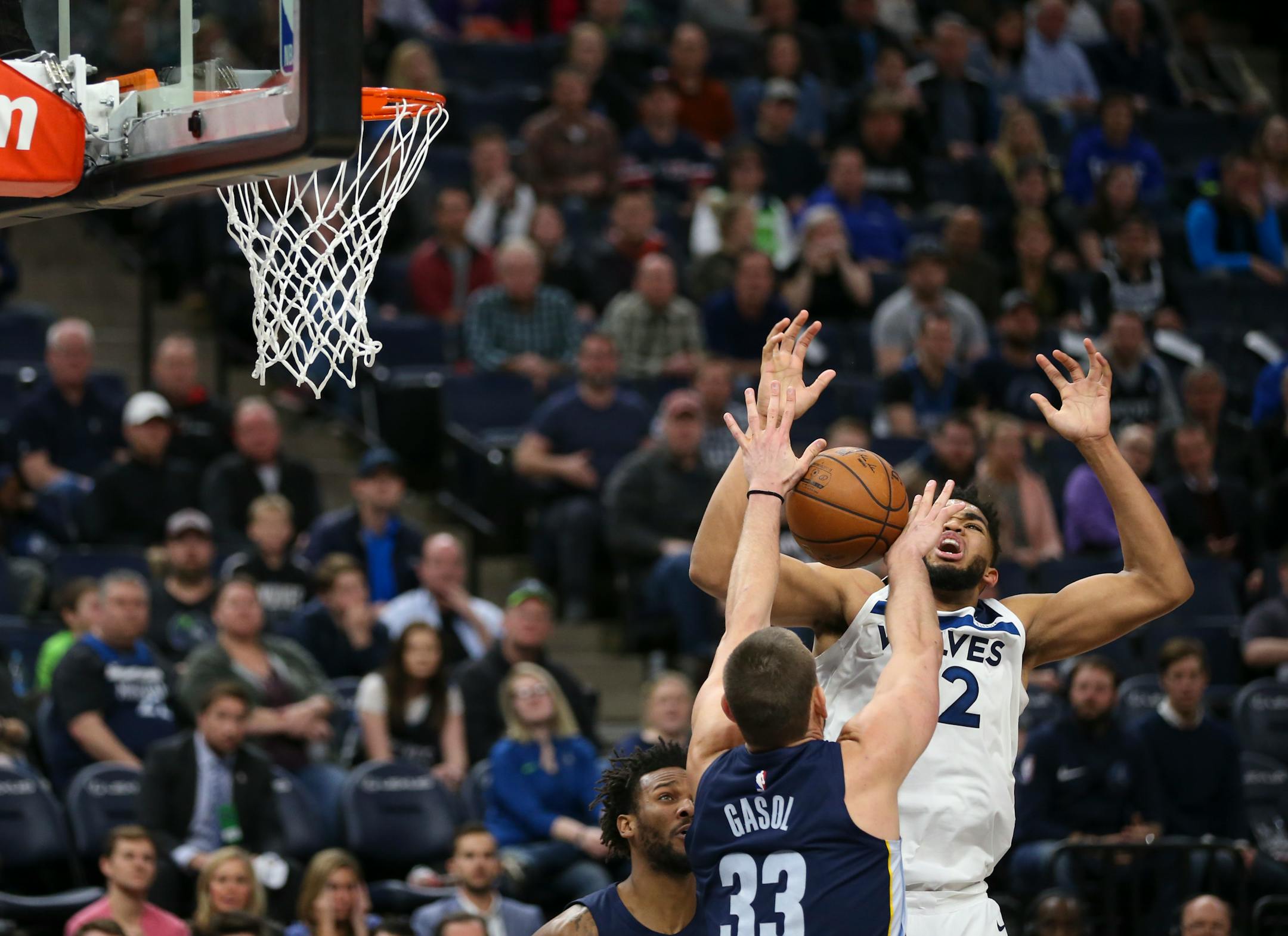 Wolves center Karl-Anthony Towns had the ball stripped from him by Grizzlies center Marc Gasol as he drove to the basket in the fourth quarter.