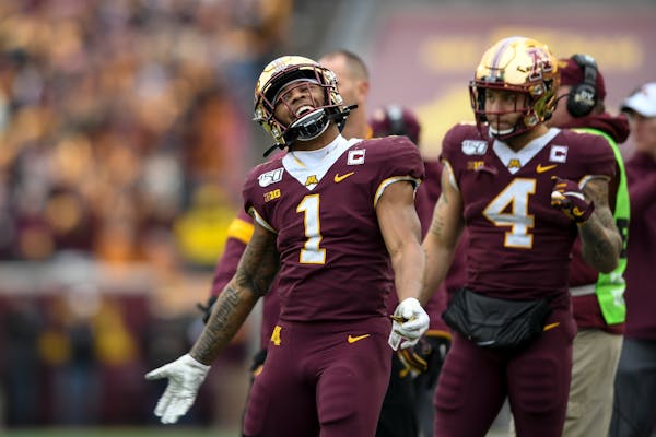 The Gophers' Rodney Smith (1) and Shannon Brooks (4), along with Mohamed Ibrahim, all are competitive and could be the No. 1 running back on most team