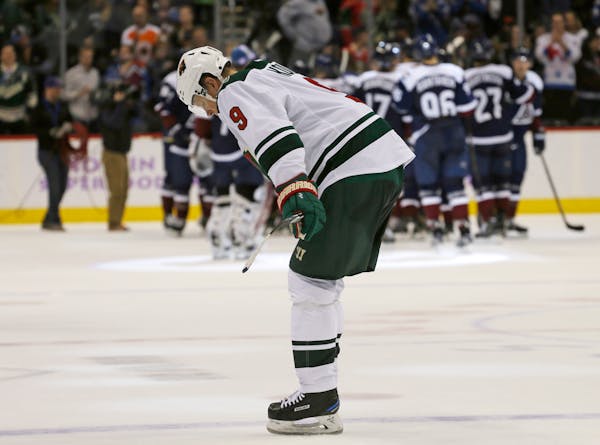 Minnesota Wild center Mikko Koivu (9) hangs his head as he skates off the ice following a 1-0 loss to the Colorado Avalanche.